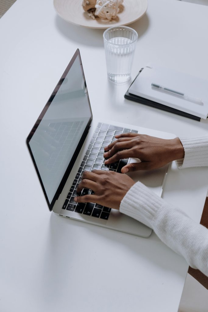  Illustrative image of Person Sitting Facing Laptop used in Accordemy®'s training on Advanced Business Blogging