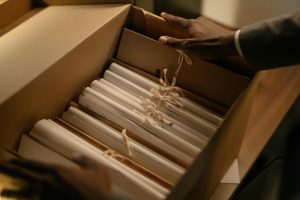 Illustrative image of Cardboard Box Full of File Folders used in Accordemy®'s training on Archiving and Records Management.