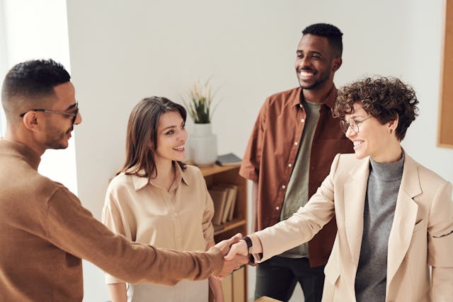 Illustrative image Photo Of People Doing Handshakes used in Accordemy®'s training on HR for the Non HR Manager