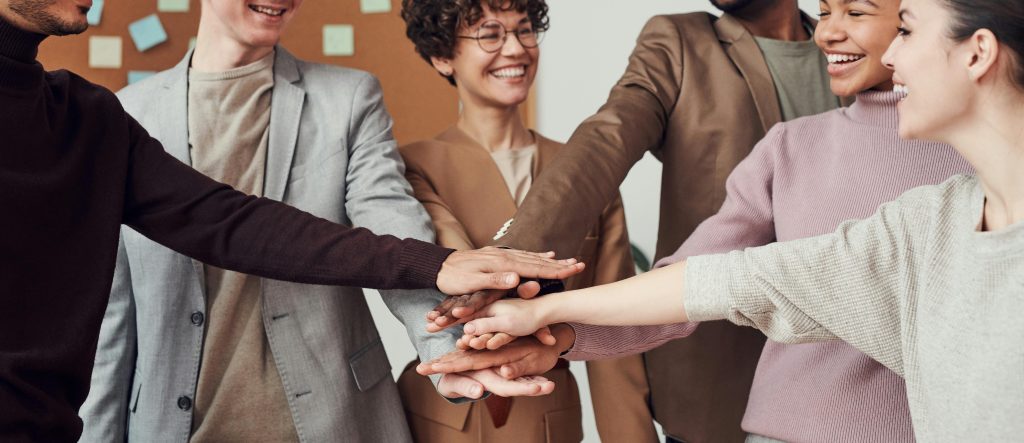 Illustrative image of Photo Of People Holding Each Other's hands used in Accordemy®'s training on Internal Communications Strategy.