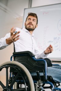 Illustrative image A Man Discussing while Doing Hand Gestures used in Accordemy®'s training on Talent Management