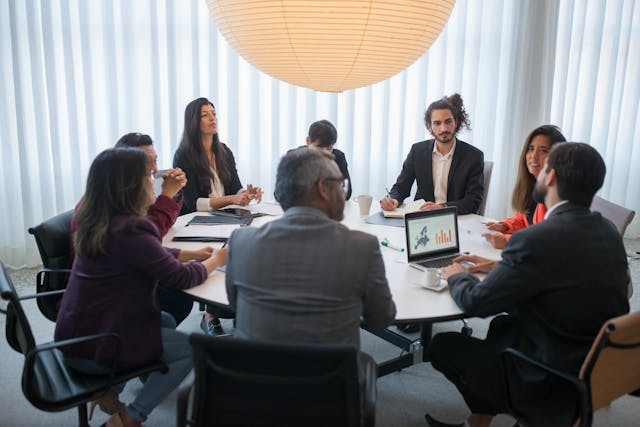 Illustrative image A People Having a Meeting at the Office used in Accordemy®'s training on Workplace Ethics for HR Professionals