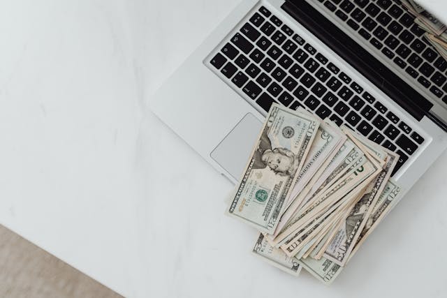 Illustrative image of A Person Typing on a Laptop used in Accordemy®'s training on HR and the Gig Economy