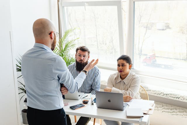 Illustrative image of Woman in White Long Sleeve Shirt Sitting 
used in Accordemy®'s training on HR Role in Innovation and Creativity