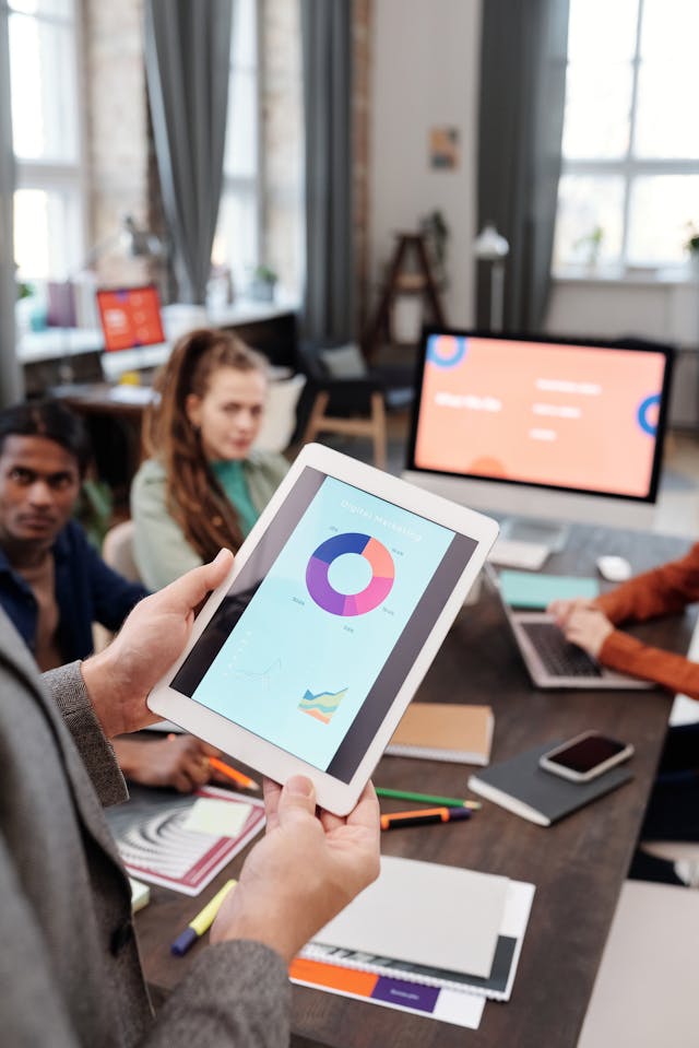 Illustrative image A Person Holding a Tablet used in Accordemy®'s training on Measuring Results From Training