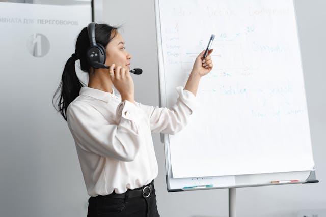 Illustrative A Woman in White Long Sleeve used in Accordemy®'s training on Facilitation Skills