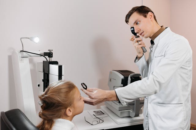 Illustrative image of An Ophthalmologist Conducting a Vision Test
used in Accordemy®'s training on Effective Disciplinary Procedures