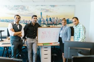 Illustrative image People Standing Beside a Whiteboard used in Accordemy®'s training on HR for the Non HR Manager