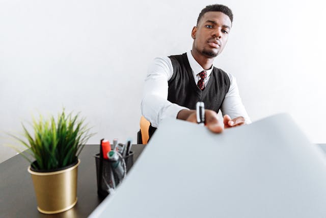 Illustrative image of Man in White Dress Shirt Sitting at the Table
used in Accordemy®'s training on HR Tech Stack Optimization