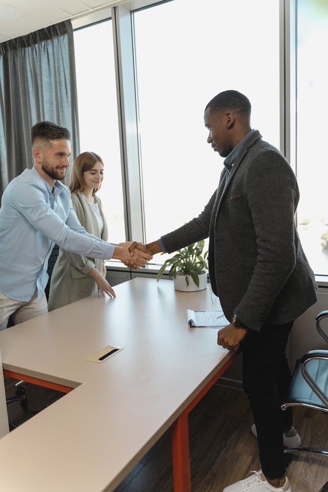 Illustrative image Man Hiring Two People used in Accordemy®'s training on Employee Recruitment
