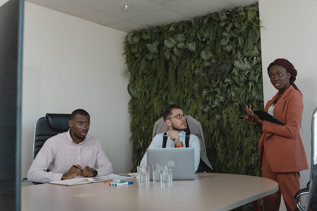 Illustrative image of Man and Woman Sitting at Table
 used in Accordemy®'s training on HR's Role in Corporate Sustainability