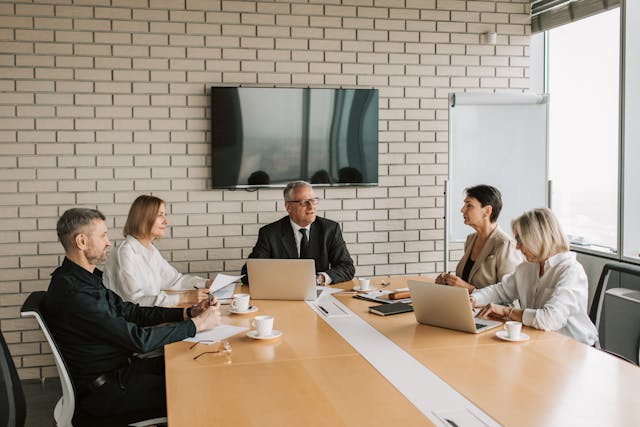 Illustrative image People having a Business Meeting used in Accordemy®'s training on Train-The-Trainer