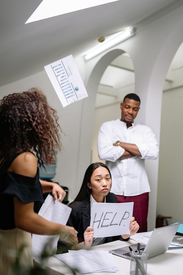 Illustrative image of A People Sitting While Reading Together
 used in Accordemy®'s training on HR Role in Crisis Communication