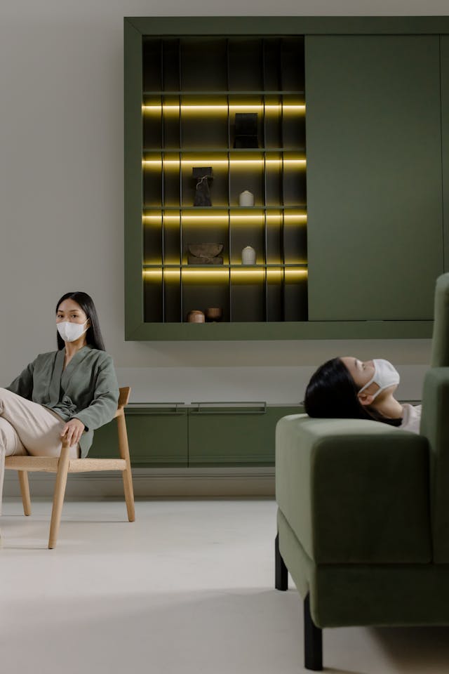 Illustrative image Women Wearing Face Mask while Sitting on the Chair used in Accordemy®'s training on Health Equity and Social Determinants of Health