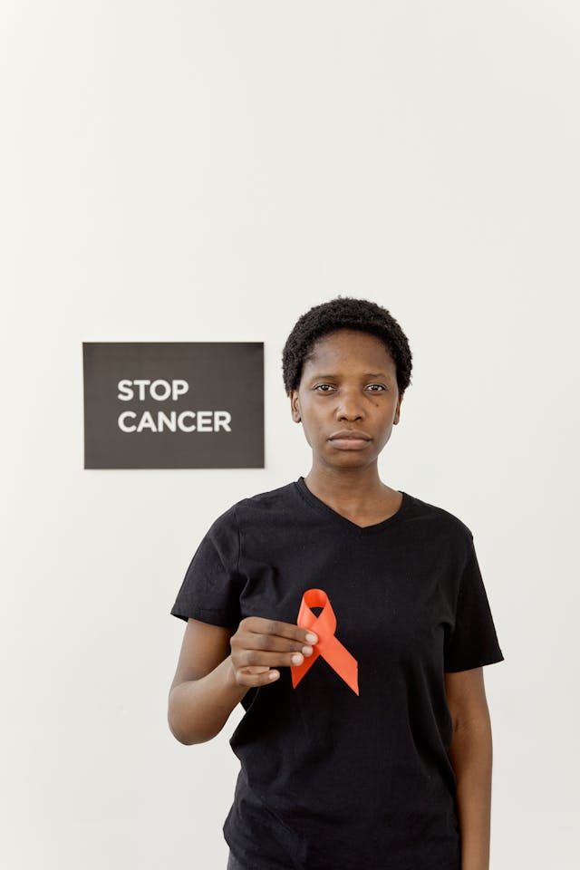 Illustrative image Woman holding an Orange Ribbon used in Accordemy®'s training on Palliative and End of Life Care