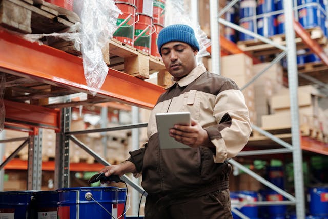 Illustrative imageMan Holding Tablet Computer used in Accordemy®'s training on Lean Logistics Implementation