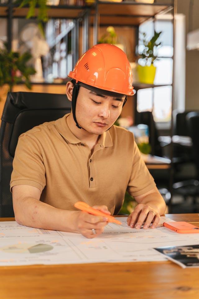 Illustrative image Man in Brown Polo Shirt used in Accordemy®'s training on Business Writing Skills for relief and development managers