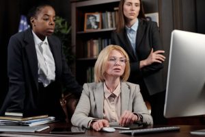 Illustrative image Businesswomen in an Office Looking at a Computer used in Accordemy®'s training on Executive and Personal Assistants