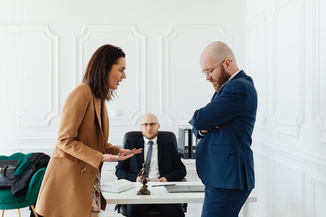 Illustrative image A Man Sitting at a Desk used in Accordemy®'s training on Conflict Management and Resolution for Administrators