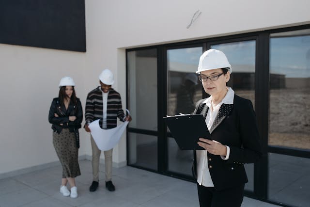 Illustrative image Seller in Suit and Clients Standing by House Windows used in Accordemy®'s training on Project and Program Evaluation