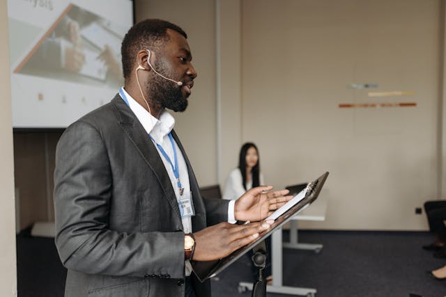 Illustrative image A Bearded Man Talking Inside the Conference Room used in Accordemy®'s training on Training Manager