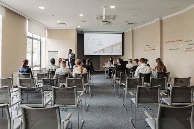 Illustrative image People Sitting on Chair used in Accordemy®'s training on Training Manager
