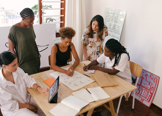 Illustrative image Photo of Women at the Meeting used in Accordemy®'s training on Community Assessment and PRA
