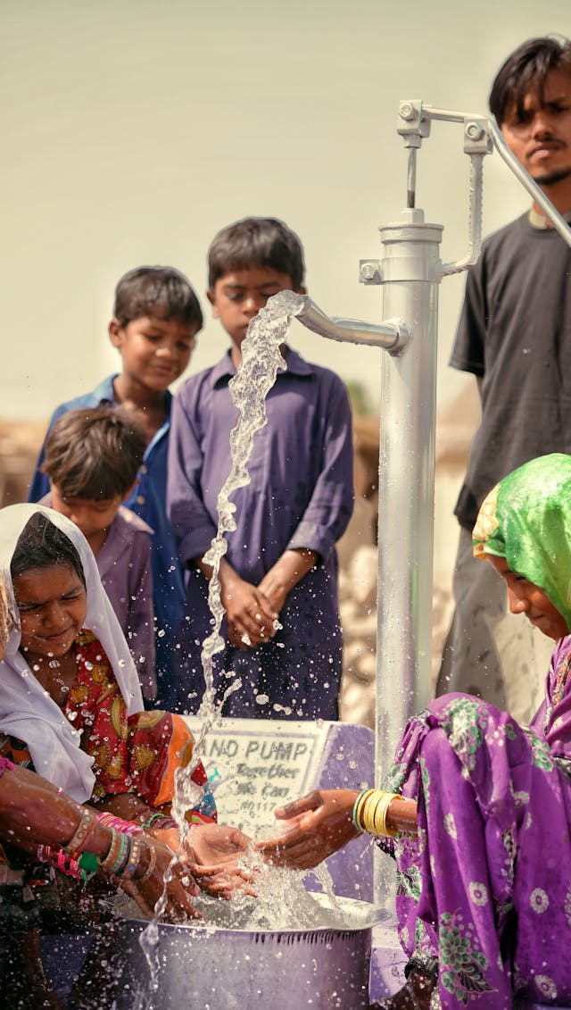 Illustrative image Close-up Of A Child's Hands Catching Water used in Accordemy®'s training on Sustainable Livelihoods in Post-Disaster Recovery

