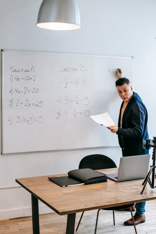 Illustrative image Photo Of Man Discussing Via Electronic Device used in Accordemy®'s training on Accordemy® Certified Trainer Level 4 B