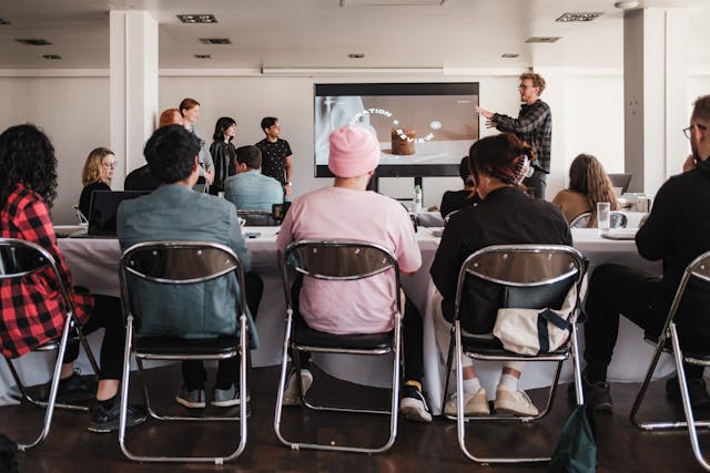 a group of people sitting at a table
