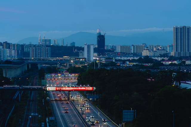 a highway with cars on it
